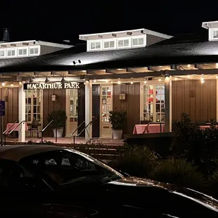 the front of the restaurant at night