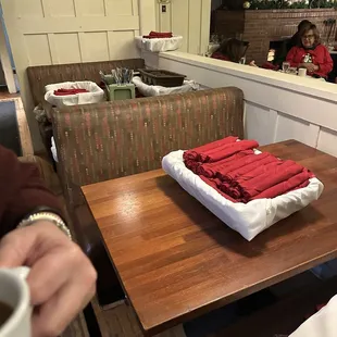 Tables with stacks of utensils and other bins- totally unacceptable. Super tacky