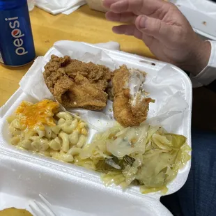 a meal in a styrofoam container