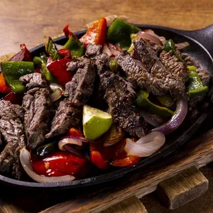 steak and vegetables in a skillet