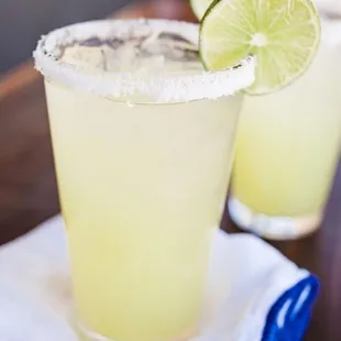 two margaritas on a table