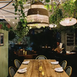 a wooden table and chairs