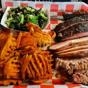 3 meat combo with broccoli and sweet potato fries.