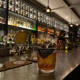 Black sesame whiskey drink and the bar area