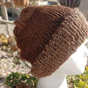 Reversable knit hats, created from our alpaca's wool