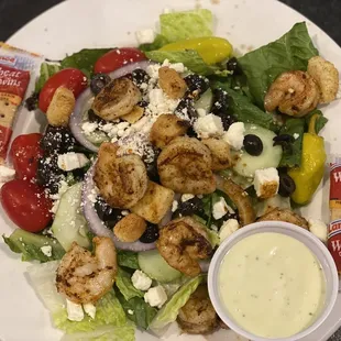 Mediterranean salad with salmon swapped out for shrimp.