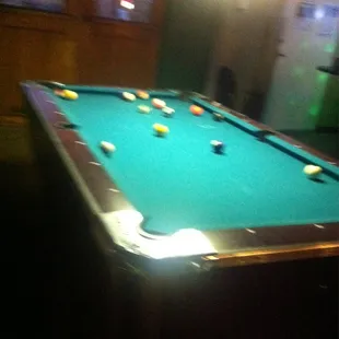 Two pool tables! Has amature tournaments.