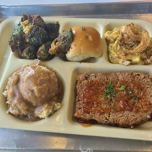 Meatloaf, Brussel Sprouts, Mashed Potatos, Squash Casserole, and a roll with a very decent Arnold Palmer.