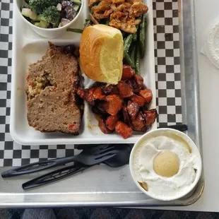 Broccoli salad, meatloaf, carrots, green beans with banana pudding