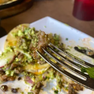 a plate of food with a fork