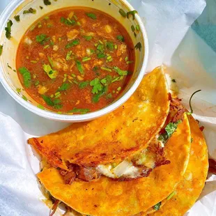 a bowl of soup and a plate of quesadillas