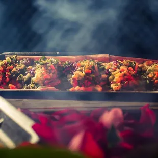 a tray of food being cooked