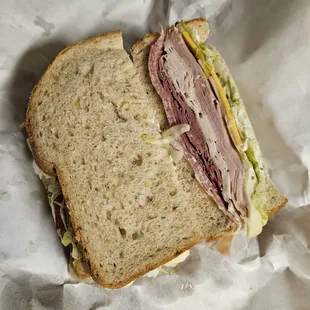 The Machete. Over 1/2lb of 4 meats, 2 cheeses, with toppings and sauce.