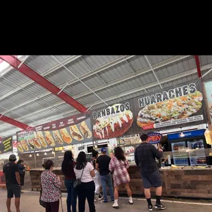 a group of people standing in line