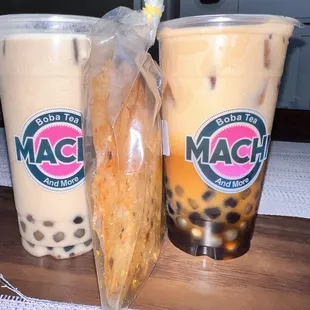 two cups of boba and a bag of chips