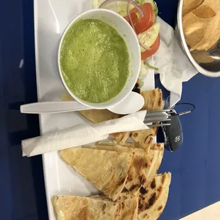 Cheese quesadilla and the famous green sauce