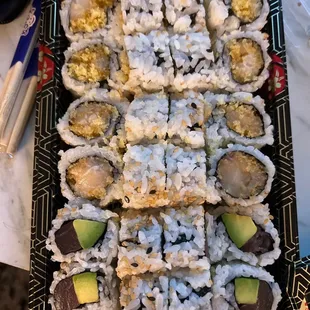 Any 3 Rolls -Spicy Yellowtail Roll, Tuna and Avocado Roll, and Spicy White Tuna Roll.