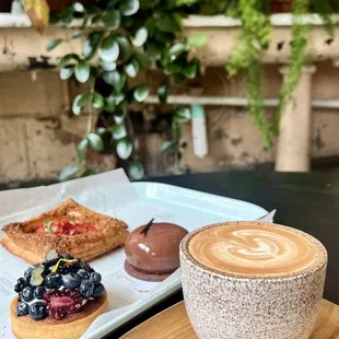 Blueberry Tart, Chocolate Cake and a savory pastry with Tomato + Two Persons Coffee