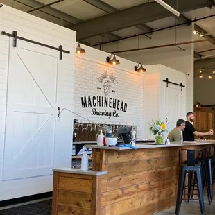 MachineHead Brewing Co. backdrop to the bar.