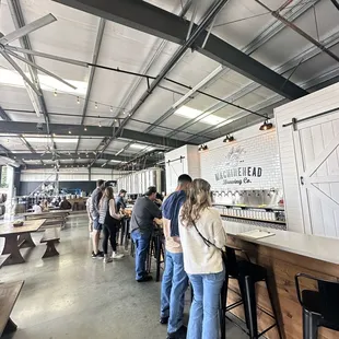 Bar top service and brewery with many seating options.