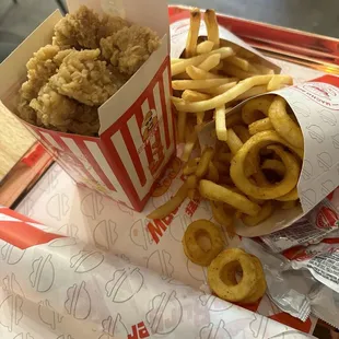 In love with the popcorn chicken and Fries