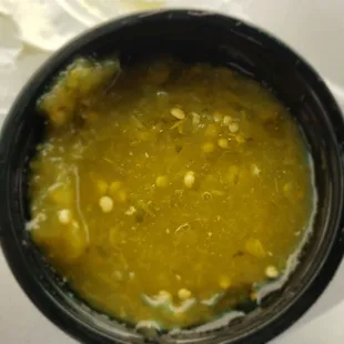 The green is spicy and gel like so the whole cup wants to pour on my burrito