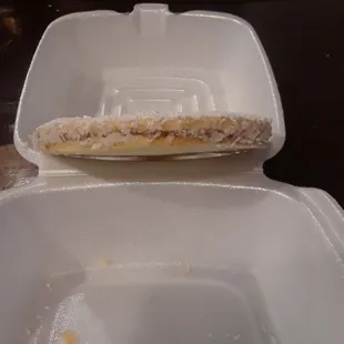 Coconut on the edge of the alfajores. No mention of coconut on the menu item.