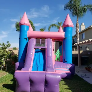 Jumper with slide and inside basketball hoop.