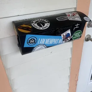 a mailbox attached to a door