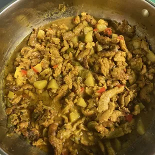 a pot of stew with meat and vegetables