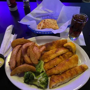 Perch dinner with broccoli, fries and pita.  Blackened and pan fried