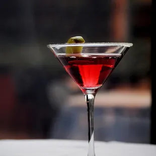 a martini with olives