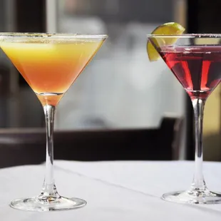 two cocktails on a table