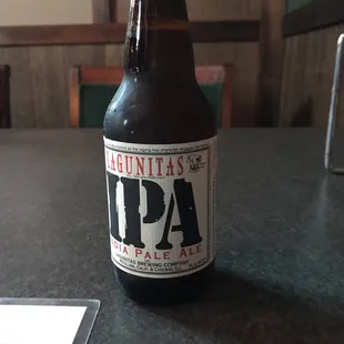 a bottle of beer on a table