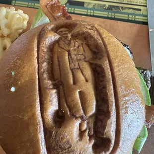 Haggin oaks logo pressed in the bun