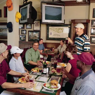 a group of people enjoying a meal