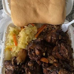 Stew Chicken with 2 sides Coco Bread Rice and Peas Cabbage