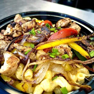 a plate of food with meat and vegetables