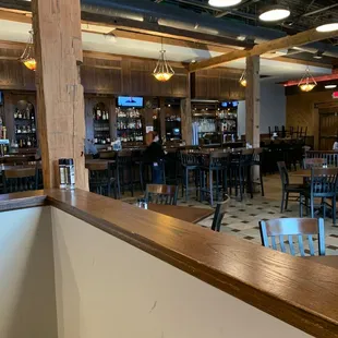 Part of the huge bar that spans nearly  The entire side of the indoor portion of this restaurant. It is beautiful!!!