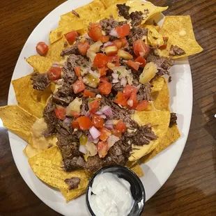 Fall menu is in and the short ribs nachos are back!! Delicious!! Always has amazing &amp; friendly staff!!
