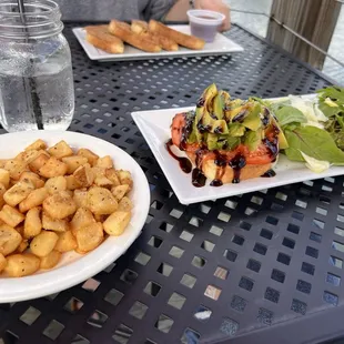 Avocado toast, potatoes and French toast