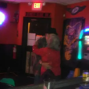 a man and a woman playing a video game