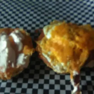 two pastries on a checkered napkin