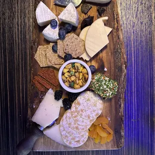 Loved the aesthetic wooden board and cheese knifes Charcuterie board! Sooo perfect for date nite. assorted cheeses were delicious.
