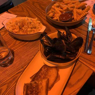 Muscles, fries, lobster Mac and cheese