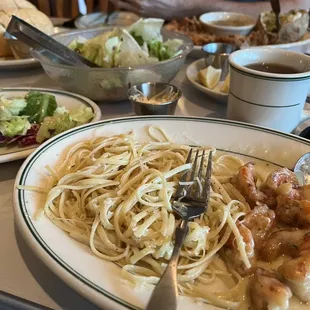Shrimp with Citrus Beurre Blanc Sauce, tea, salad, fried chicken, bread..