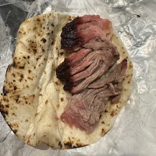 "TACO GORDO "? Brisket is tasty &amp; Smoked w mesquite . Store bought tortilla . I keep trying to support .