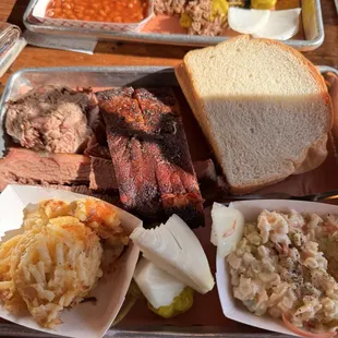 3 Meat Combo. Ribs, Sliced Beef, and Pulled Pork. Sides: Campfire Potatoes &amp; Cole Slaw