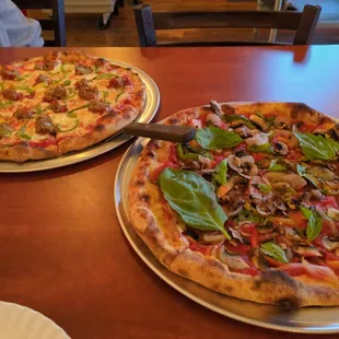 Triple parmesan meatball and a veggie with fresh basil on top.