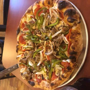 a whole pizza on a pan